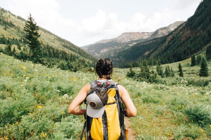 Young girl on an adventure in the mountains