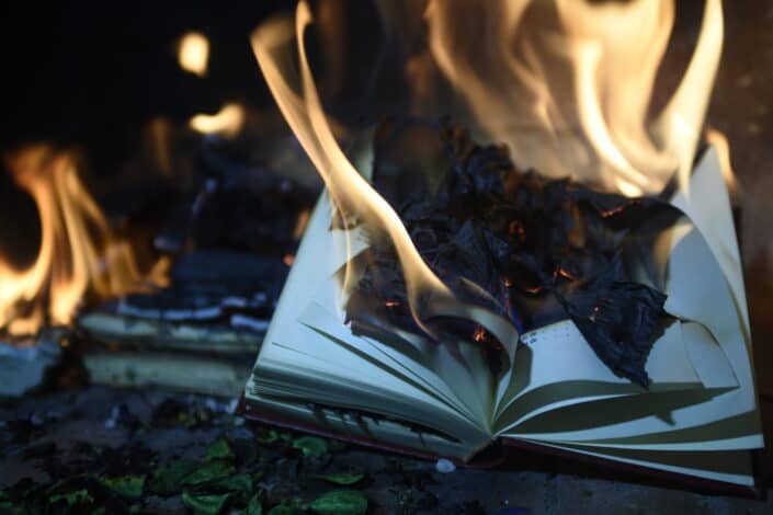 Burning book page