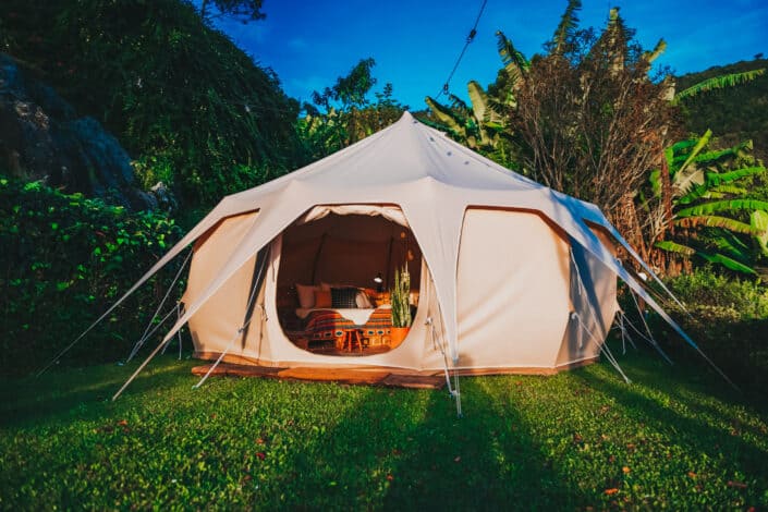 Camping tent on grass lawn