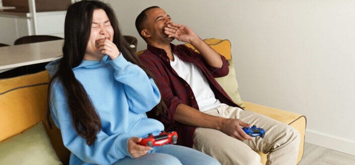 Couple Playing Video Game Together at Home