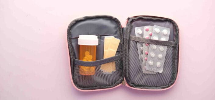 First aid kit with medicines and pills