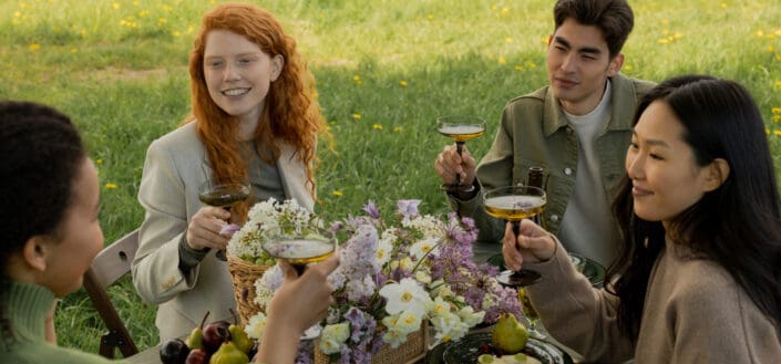 Friends Having a Picnic Outdoors