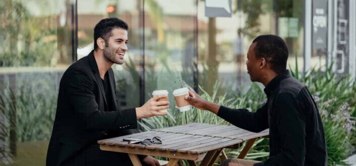 Male Colleagues Having Coffee at a Cafe