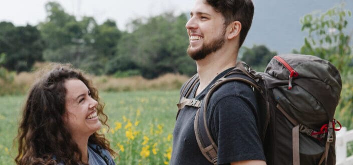 Man and woman laughing with each other