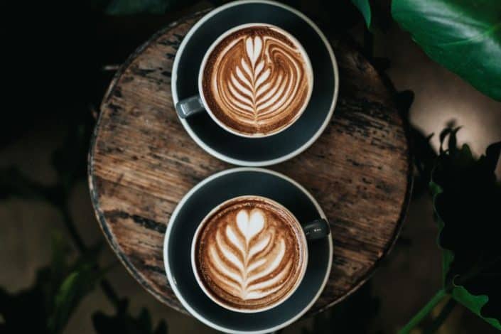 Two mugs with Latte art