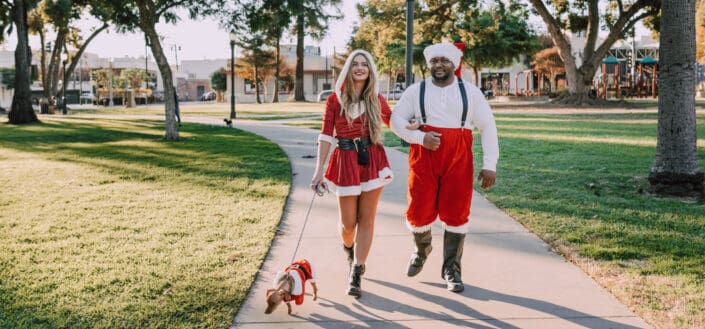 Couple wearing Christmas costumes
