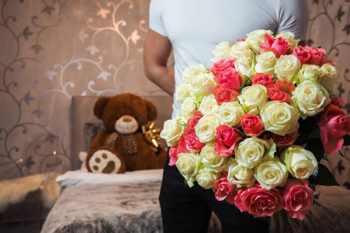 Man Holding Flower Bouquet