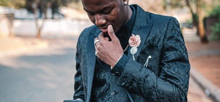 man in black suit jacket