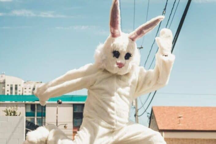 person in bunny costume striking a pose