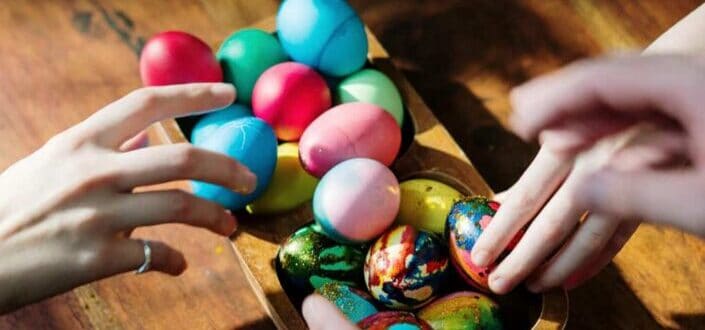 People holding assorted easter eggs