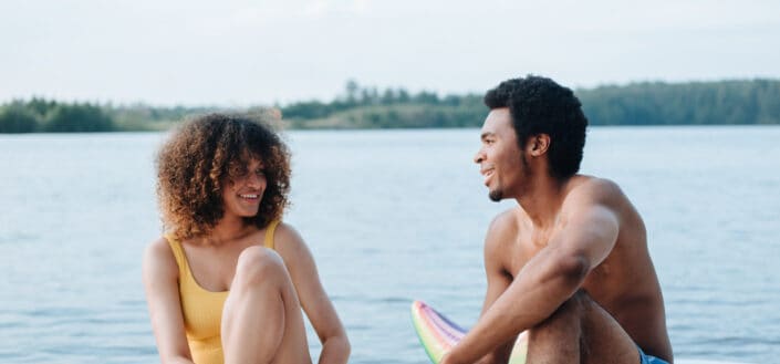 Couple spending time with each other along the lake