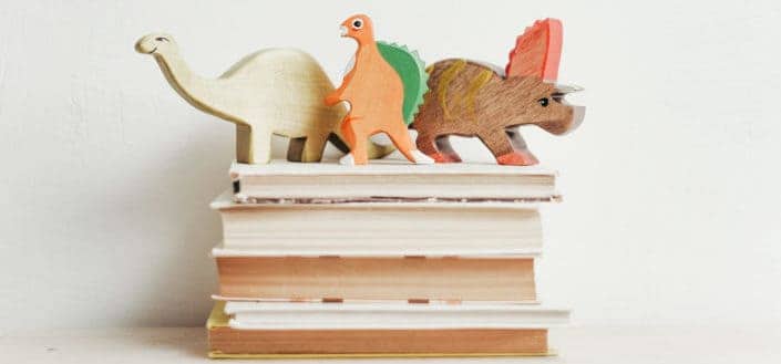 three wooden dinosaur 