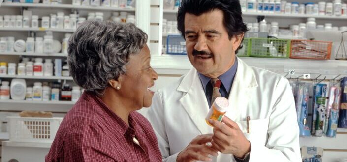 Woman Consulting With Her Pharmacist