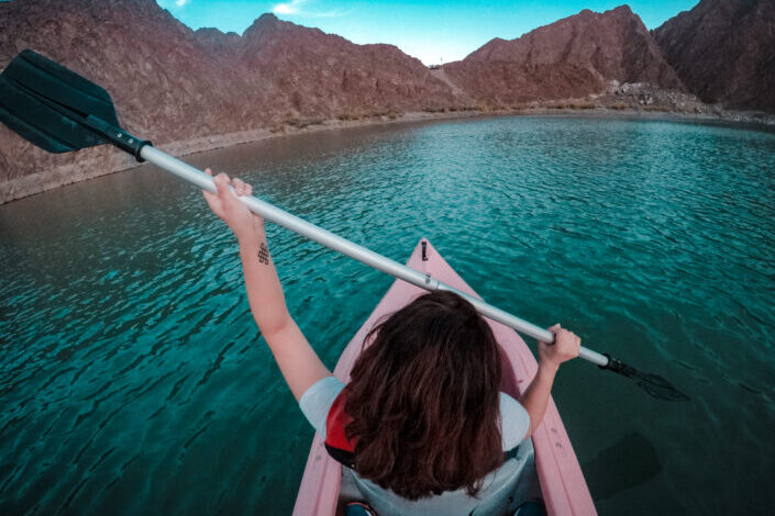 Woman using paddle