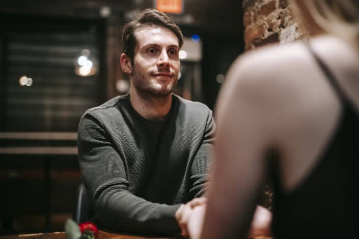 Young couple spending time together in restaurant