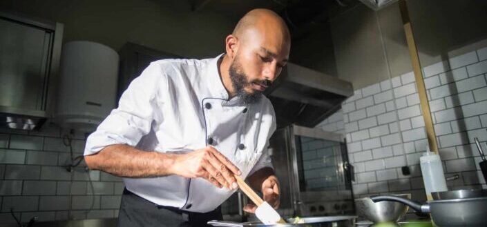 A chef cooking in the kitchen