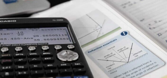 calculator and open high school physics textbook