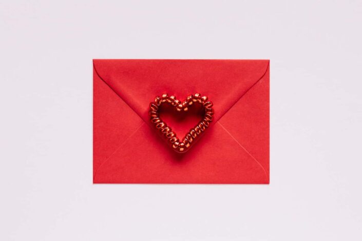 Red Gift Envelope With a Heart Seal
