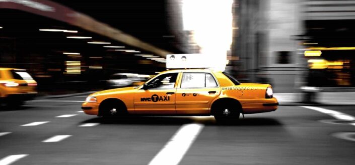 NYC Yellow Cab passing by in Midtown