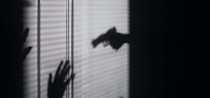 shadows held at gunpoint