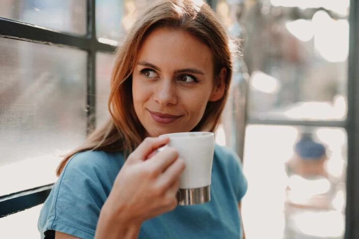 woman drinking coffee