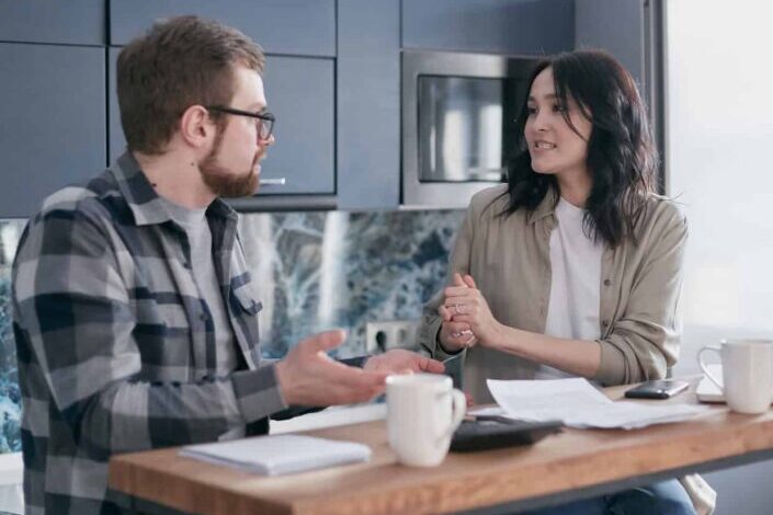 Man and Woman Talking To Each Other