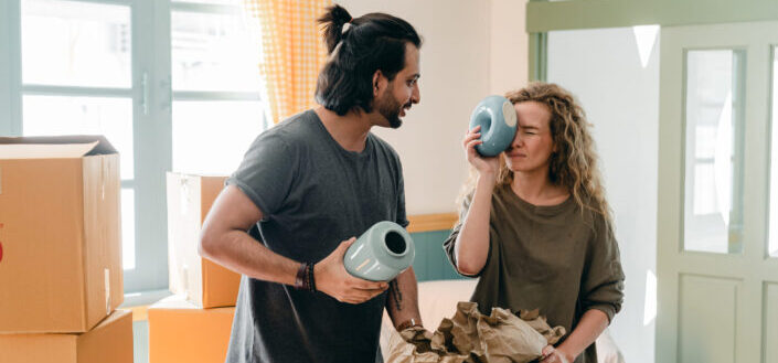 couple looking at vases