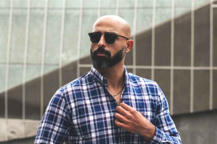 man wearing black shades