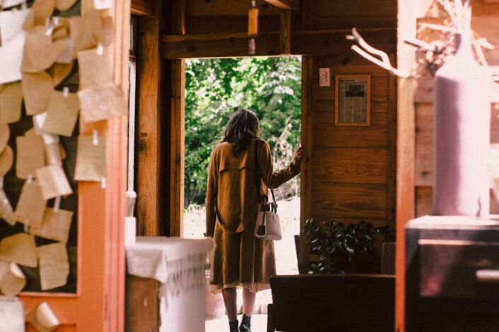 Woman Walking Out The Door