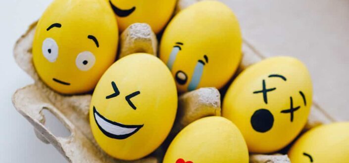 Yellow painted smiley face eggs